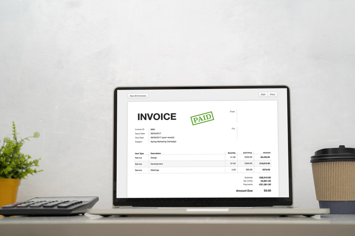 computer invoice desk white background paid bill