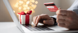 Ordering Christmas presents, online payment. Online shopping, internet banking, spending money, holidays, vacations concept online shopping msp infiniwiz