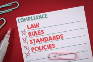 Compliance Business Concept. Check list with text on a red background.Corporate Transparency Act