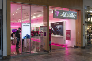 Indianapolis - Circa January 2021: T-Mobile Retail Wireless Store. T-Mobile merged with Sprint in hopes of advancing 5G development.