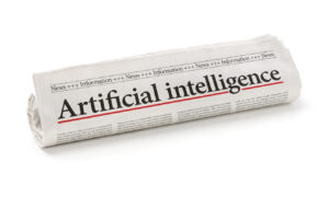 Rolled newspaper with the headline Artificial intelligence