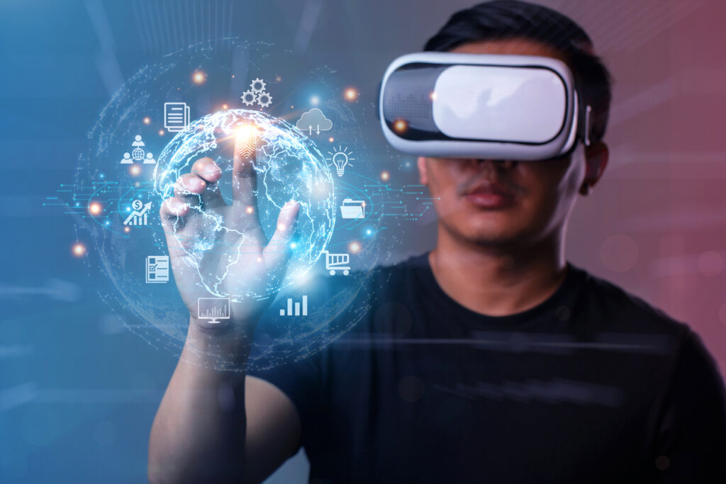 Metaverse and Future digital technology.Man wearing VR glasses hand touching virtual Global Internet connection metaverse.Global Business, Digital marketing, Metaverse, Digital link tech, Big datac vision pro apple